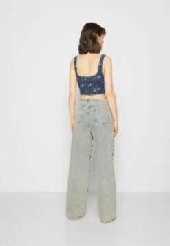 Jaded London EXTREME SLASHED LOW RISE - Jeansy Bootcut - Blue -Fashion Pol 5c45f92c9ceb48a8bada88f9223e8fd5